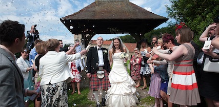 Happy Couple at the Church GAte
